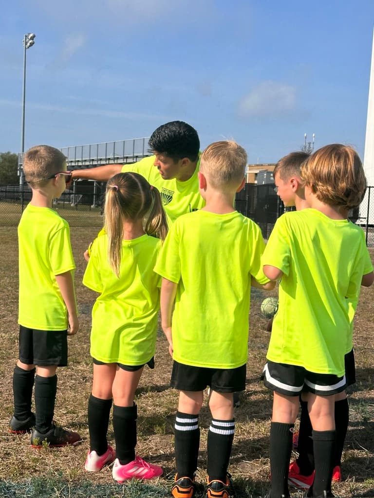 PTG coach with players